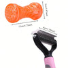 Orange stainless steel pet hair remover comb with a pink handle and black bristles