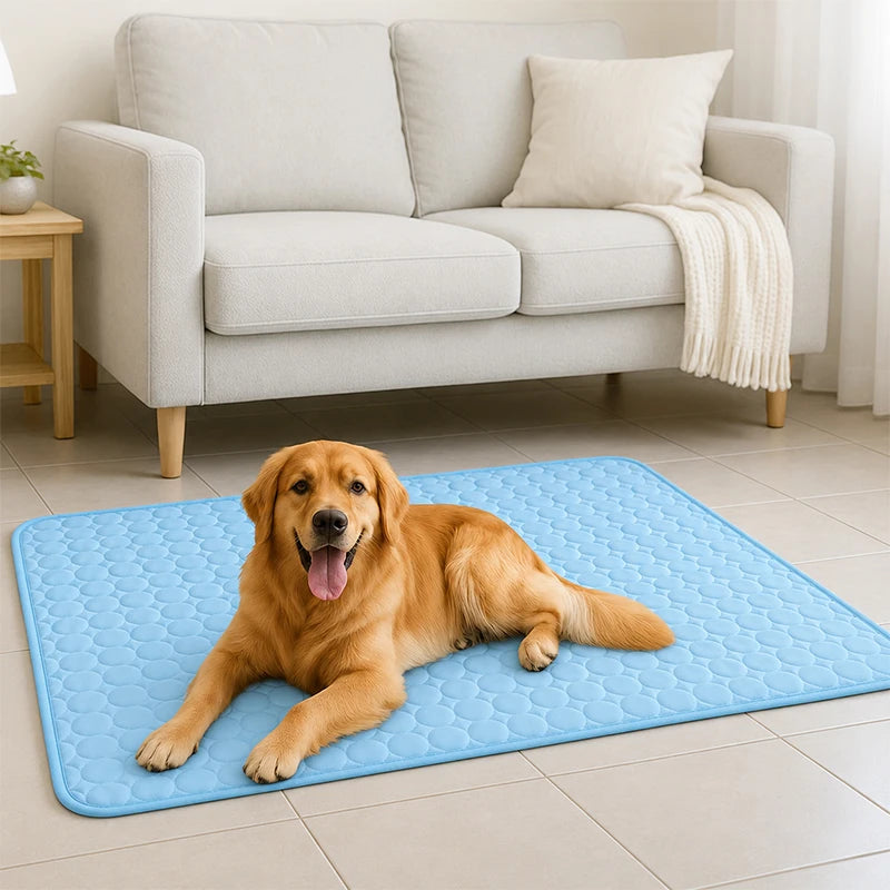 A golden retriever lies on a blue cooling mat indoors.