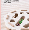 An eggshell structure puzzle toy with various colored plastic pieces for cat indoor play.