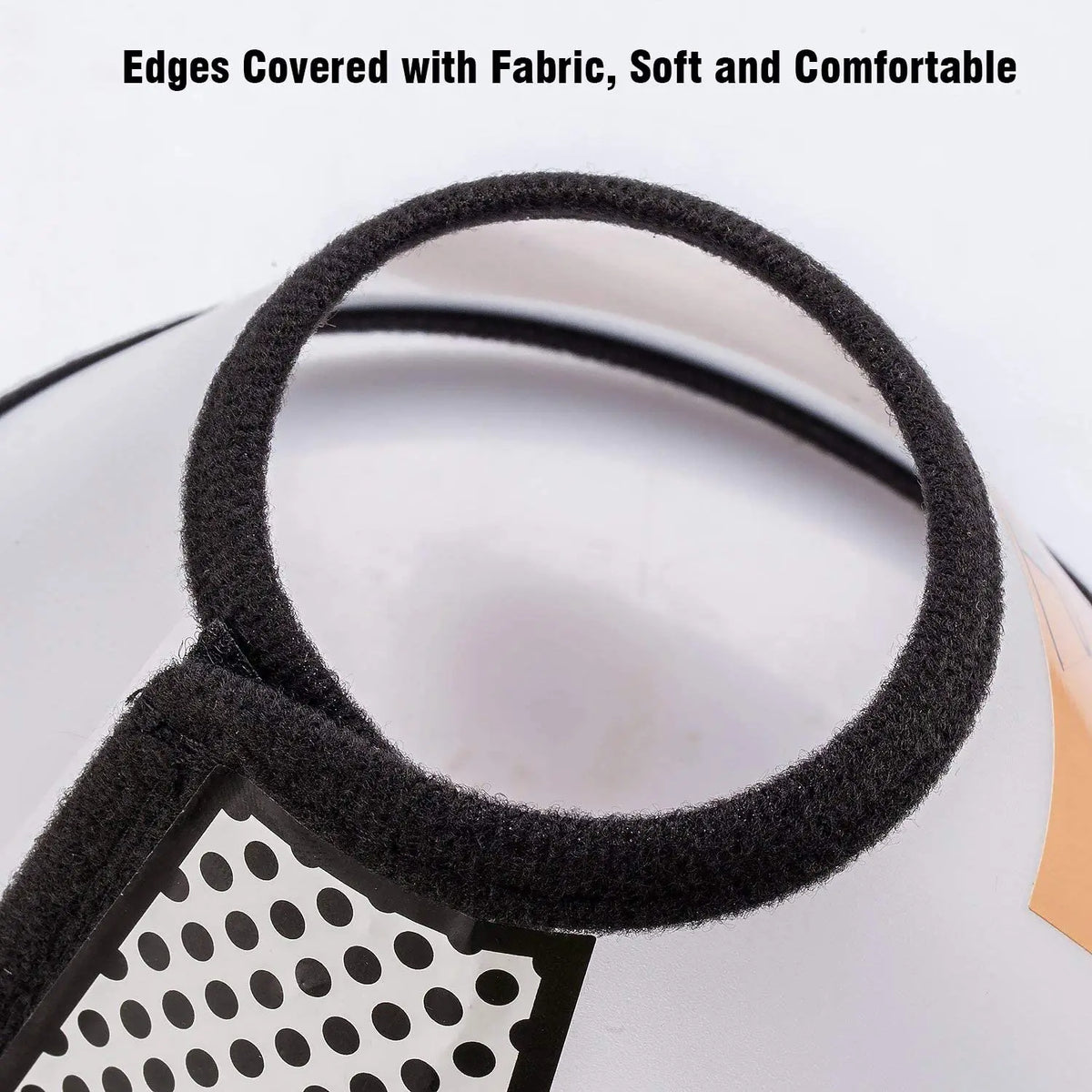 A black fabric collar with soft edges is shown on a white pet recovery device.