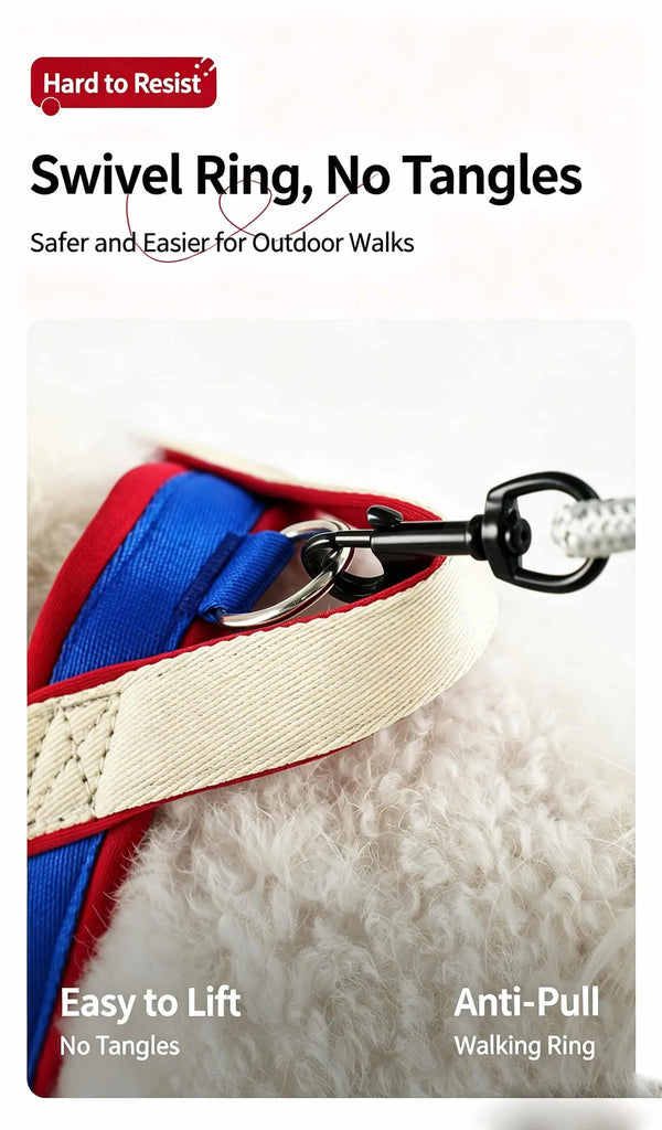 A close-up of a red and blue adjustable anti-pull dog walking ring harness on a white fluffy surface.