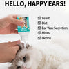 Un chat est nettoyé avec un dispositif de gouttes pour l'oreille, démontrant l'élimination des problèmes d'oreille.