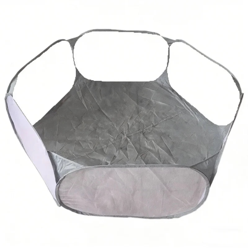 A foldable transparent pet playpen for small animals with a mesh enclosure and a solid base.