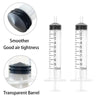 Seringue à luer en plastique avec piston noir et corps transparent, démontrant une meilleure étanchéité à l'air