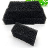 Two pieces of black aquarium bio sponge filter media are shown on a white background.