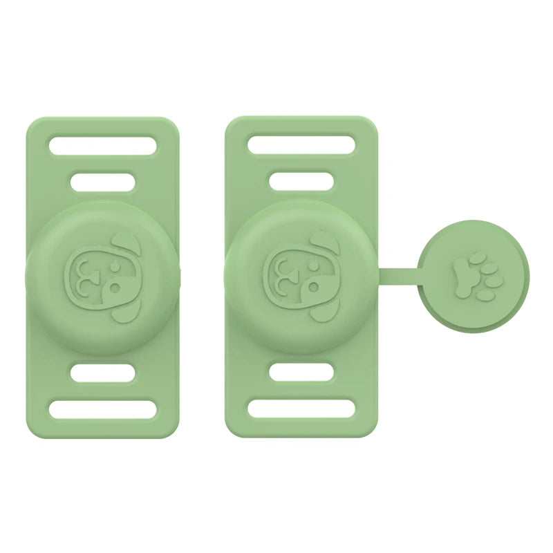 A pair of light green silicone airtag holders designed to clip onto pet collars.