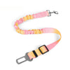 Pink and yellow adjustable dog car seat belt with elastic bungee buffer