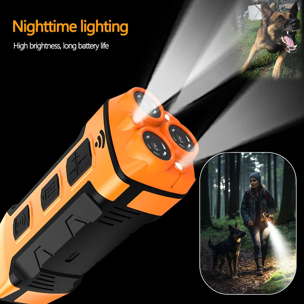 Orange and black ultrasonic dog bark control device emitting a bright light beam in a forest setting.