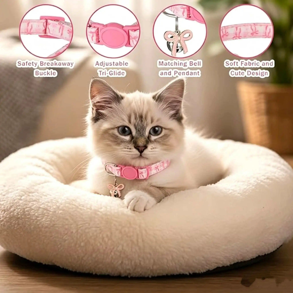 A fluffy gray kitten wearing a pink aesthetic cat collar with a bow pendant resting on a white pet bed.