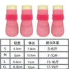 A set of pink waterproof anti-slip dog socks in various sizes S to XL are displayed.