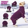 A purple windproof fleece dog jumpsuit with a high collar and elastic belly, shown on a dog in a snowy outdoor setting.