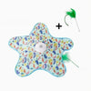 A colorful, star-shaped interactive cat teaser toy with moving green feathers and a black plus sign.