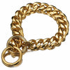 A gold stainless steel Cuban link training collar for dogs, shown in a close-up view.