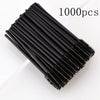 A bundle of 1000 disposable black eyelash and eyebrow brushes.