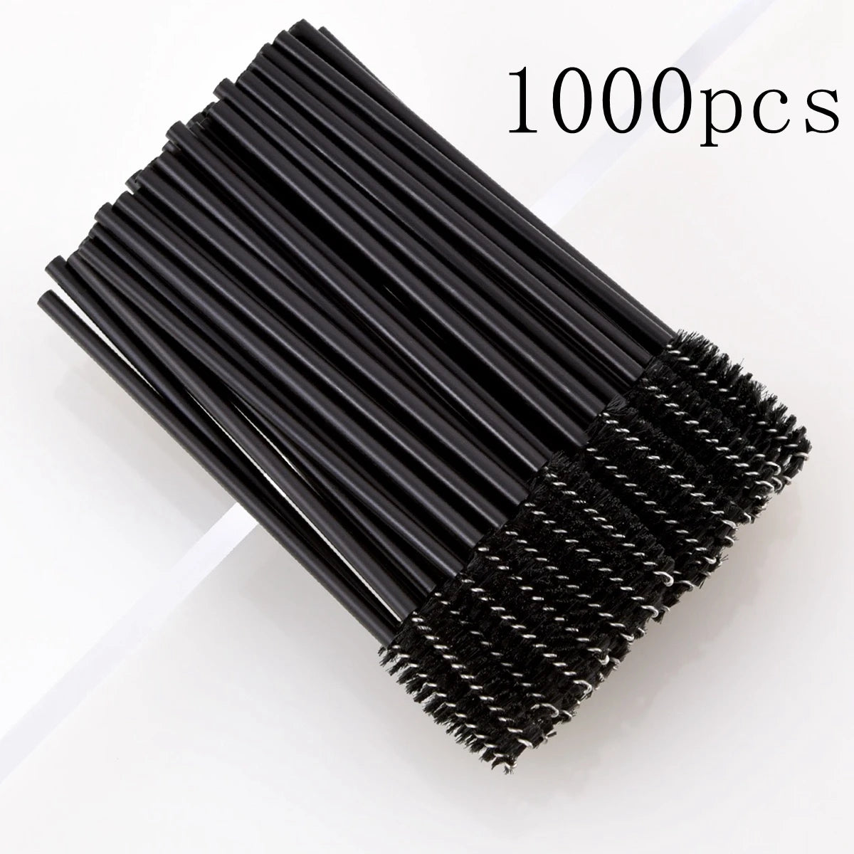 A bundle of 1000 disposable black eyelash and eyebrow brushes.