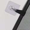 A heavy duty foldable pet gate and barrier fence with a black fabric and mesh material.