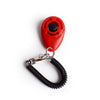 Roter Hundetrainer-Klicker mit schwarzem Knopf und schwarzem Armband.