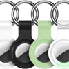 Silicone AirTag protective cover with keychain in various colors including white, black, and green.