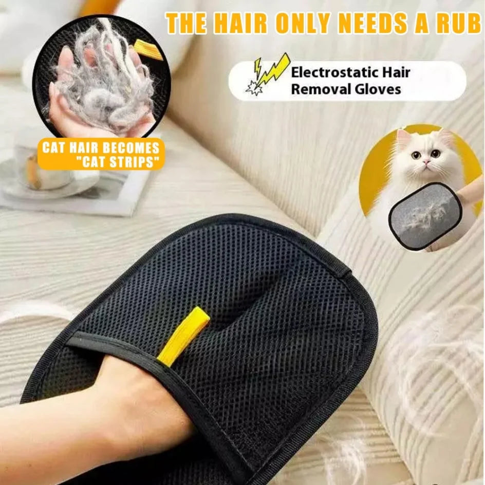 Una mano usa un guante reutilizable negro de doble cara para quitar pelo de gato.