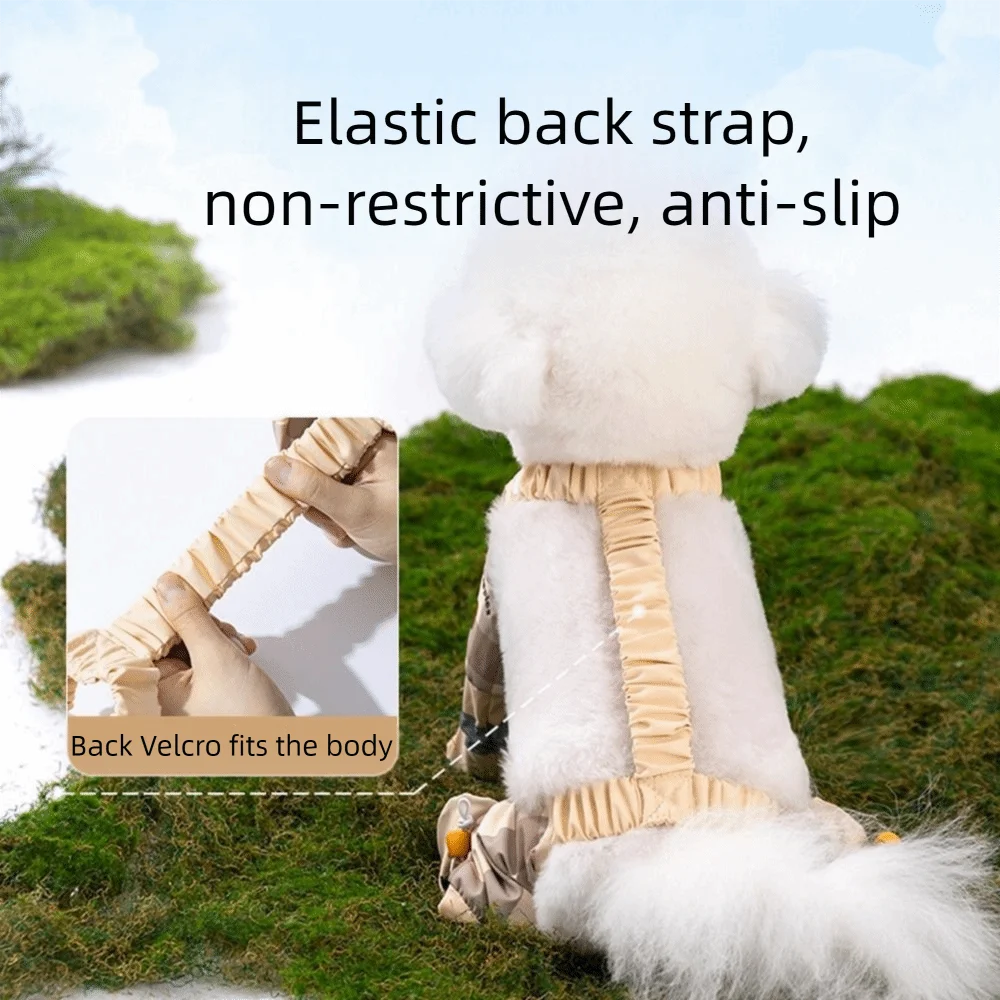 A white dog wearing an elastic back strap pet harness for walking, shown outdoors.