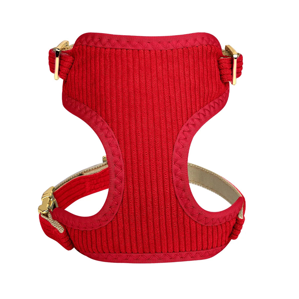 Red knitted dog harness, collar, and leash set with a bowknot.