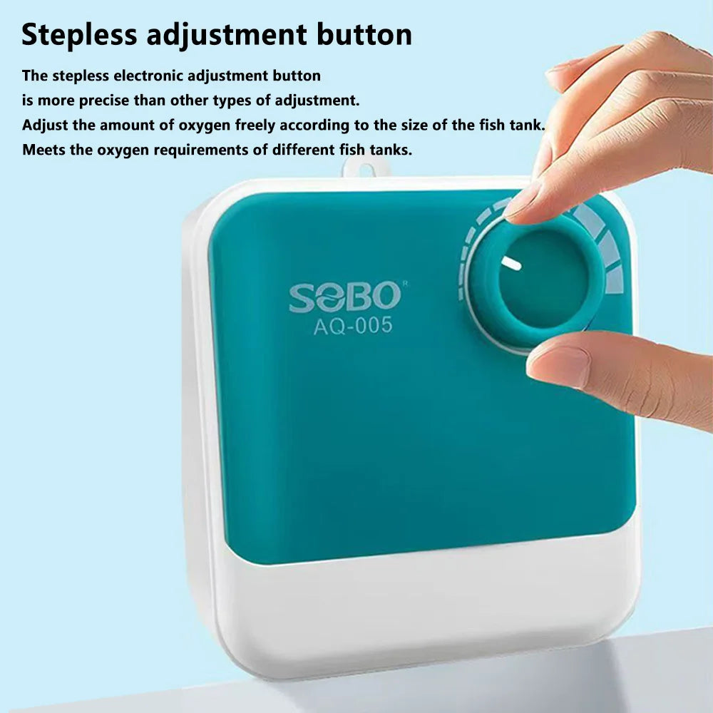 A hand adjusts the stepless electronic adjustment button on a teal and white air pump for aquarium oxygenation.