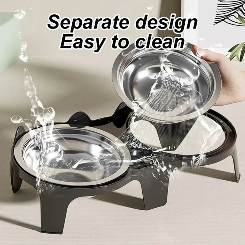 Stainless steel double pet bowl with anti-tip design being washed.