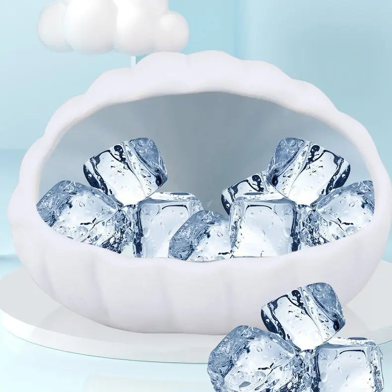 A white ceramic hamster house filled with clear ice cubes for a cooling effect.