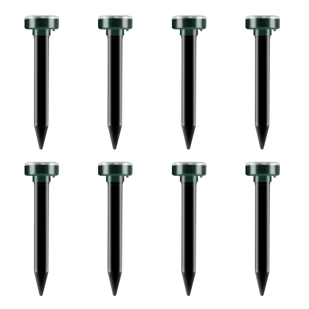 A set of five black solar powered ultrasonic pest repellers for lawn and garden