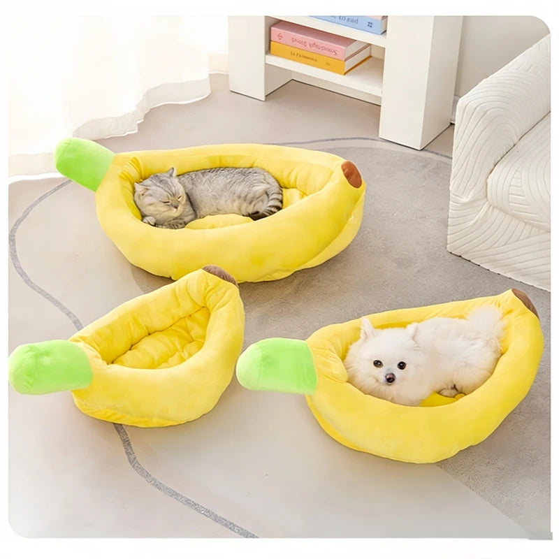 Yellow banana-shaped plush pet bed for cats and dogs with green accents