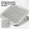 A thickened panel for efficient sand control, shown as a gray litter mat.