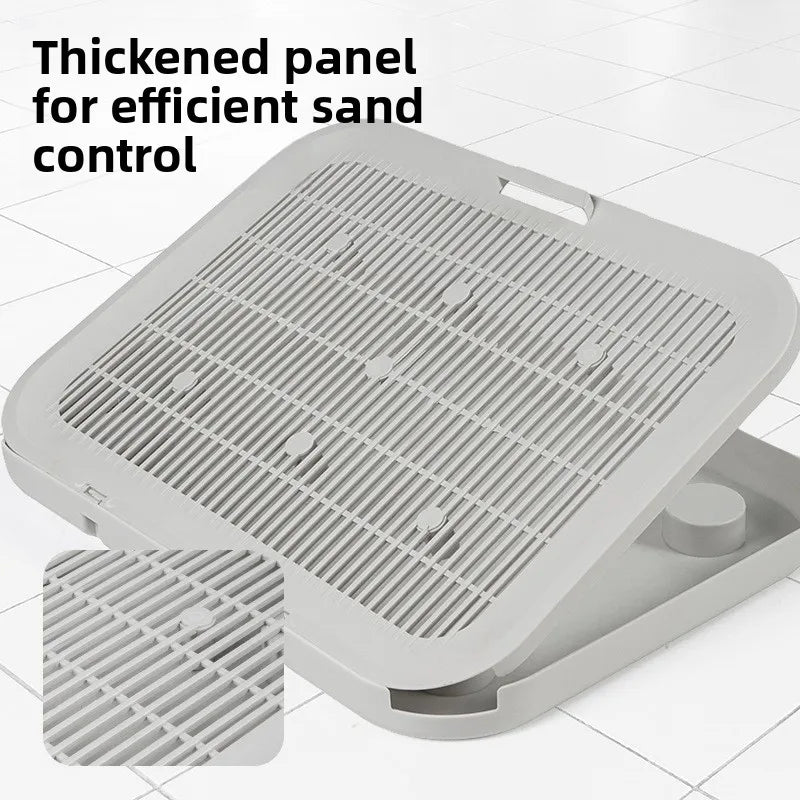A thickened panel for efficient sand control, shown as a gray litter mat.