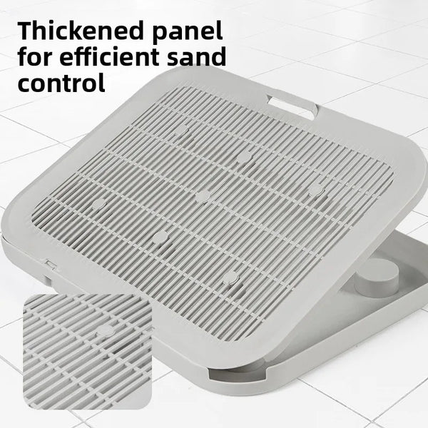A thickened panel for efficient sand control, shown as a gray litter mat.