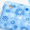 Light blue pet cooling mat featuring a winter snowflake pattern with small bubbles.