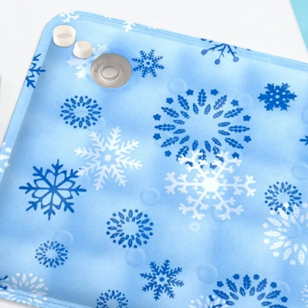 Light blue pet cooling mat featuring a winter snowflake pattern with small bubbles.
