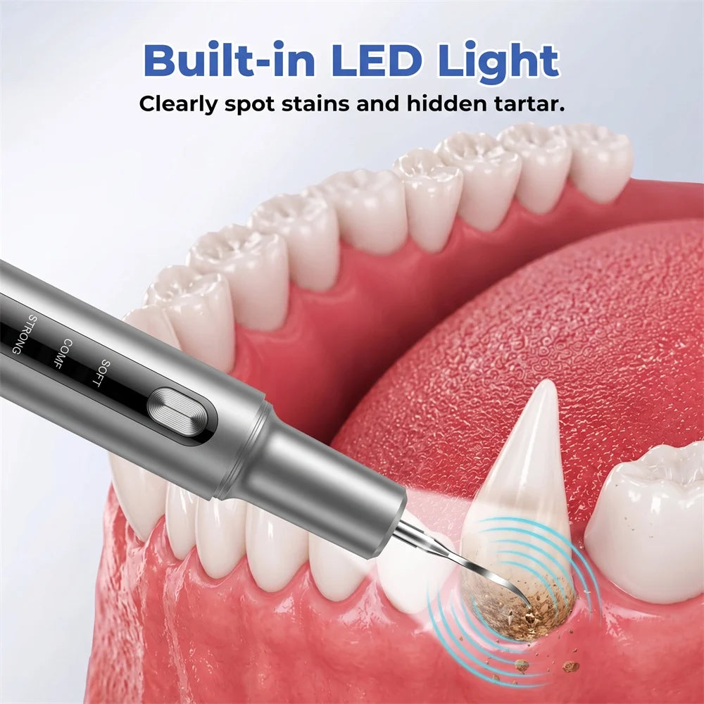 A dental ultrasonic scaler with a built-in LED light is shown cleaning teeth and gum tissue.