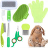 Tierpflege-Set mit grüner Elektrobürste, Silikonnagelschere und rosa Pflegehandschuhen mit einem Rabbiner
