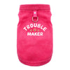 A bright pink, fuzzy pet jacket for dogs with a silver ring closure.