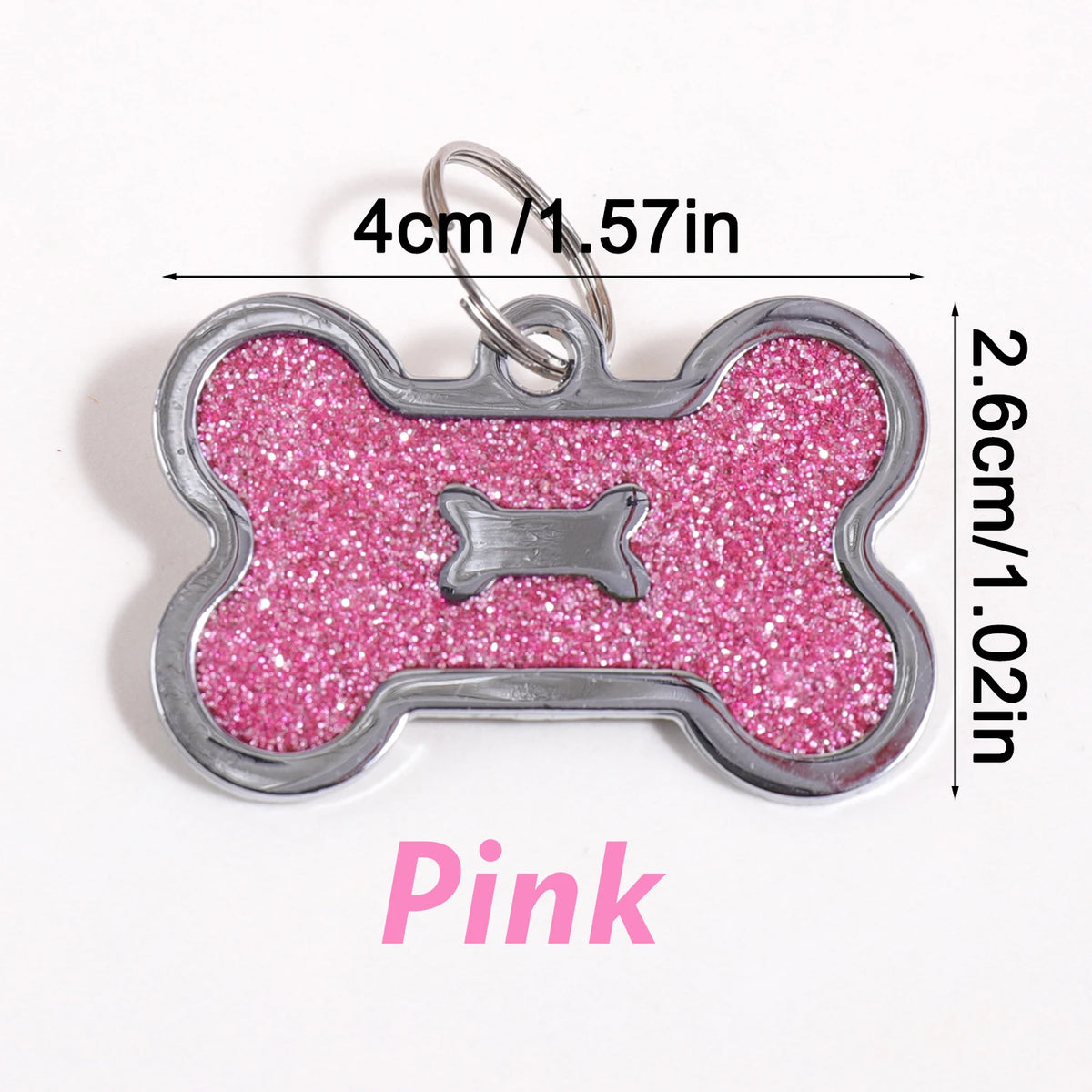 Pink bone-shaped dog ID tag with glitter finish, measuring 4cm/1.57in.