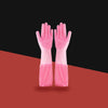 A pair of pink pet grooming gloves for dogs and cats displayed against a reddish-brown background.