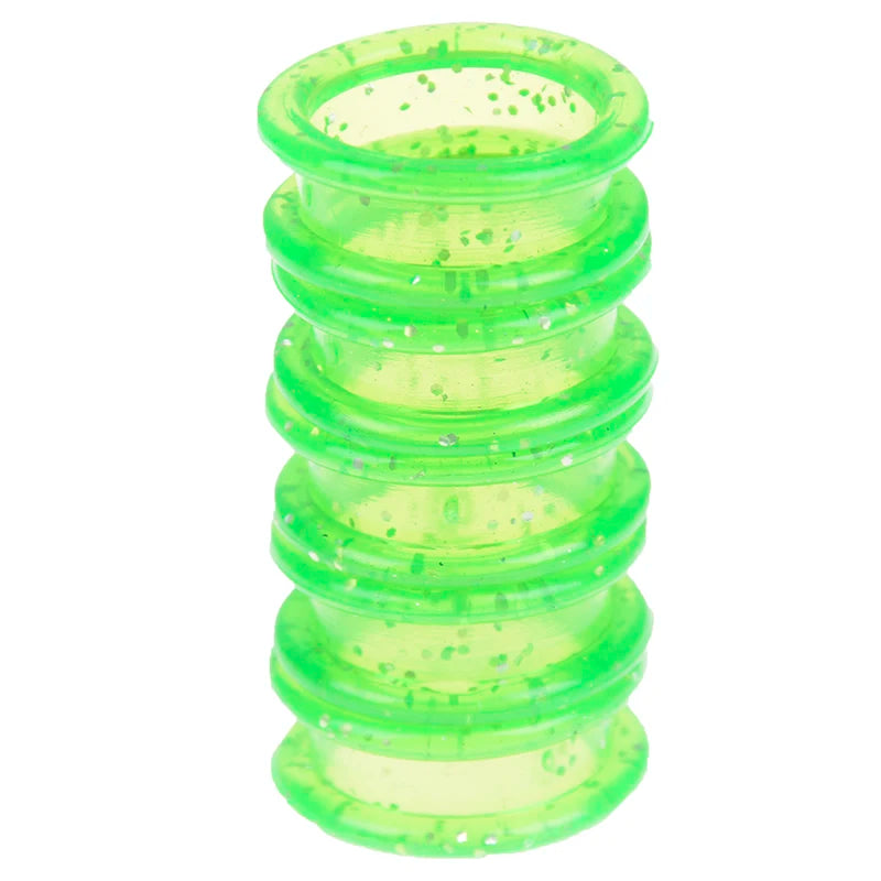 A stack of green silica gel hair scissors.