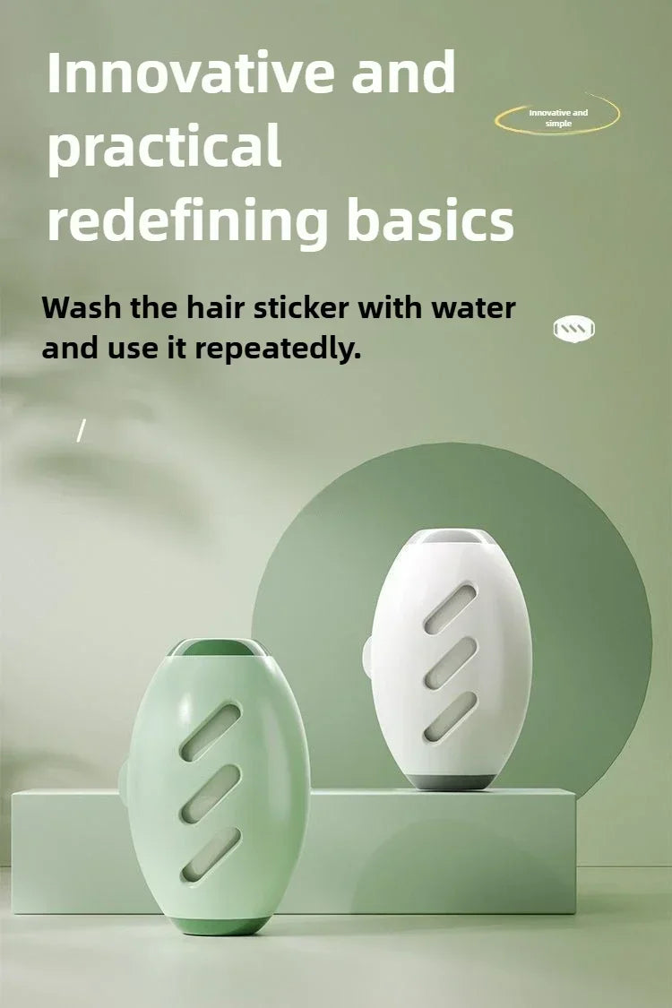 A white, oval-shaped silicone roller for pet hair removal is displayed on a light green surface.