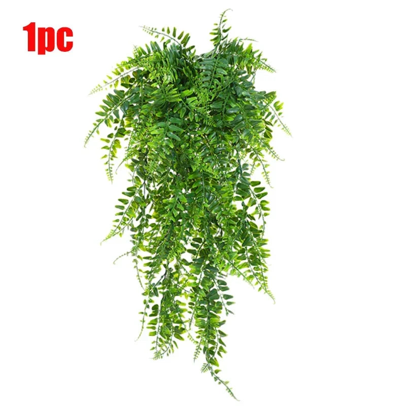 A bundle of artificial green Persian fern hanging vines.