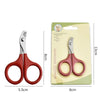 A pair of red pet nail clippers and trimmers shown next to their packaging.