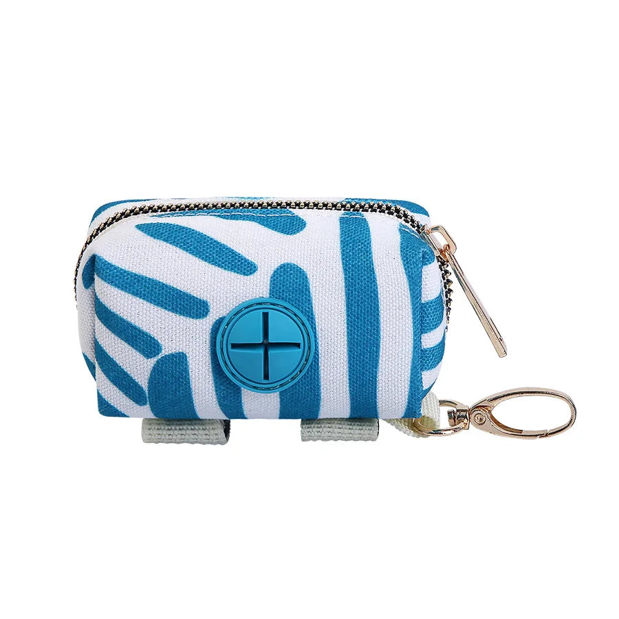 Dispenser for pet poop bags with white and blue stripes, featuring a silver chain for leash use