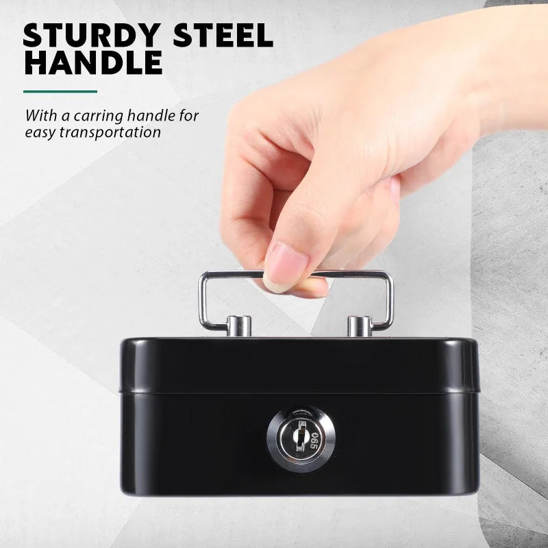 A hand is holding a black portable metal cash box with a sturdy steel handle for easy transportation.