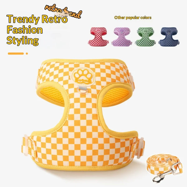 A yellow checkered no-pull dog harness with a leash is displayed, alongside other colored versions.