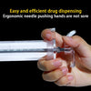 Hands are using an ergonomic needle pushing hand device to dispense medication from a syringe.