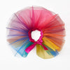 A colorful tulle tutu dress for a small dog, featuring shades of pink, purple, blue, and orange.