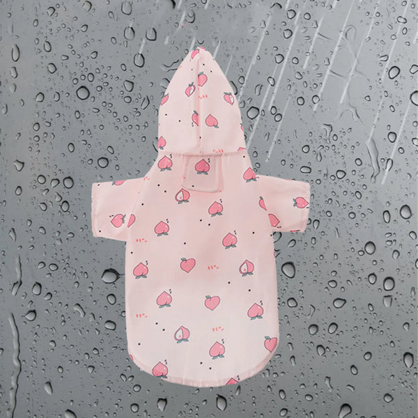 Pink cartoon printed dog raincoat for small breeds with a hood and button closure
